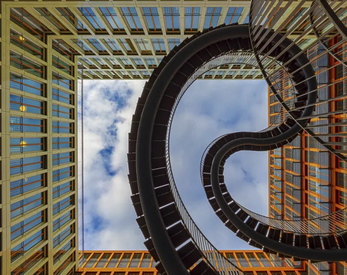 Framed Print : Modern spiral endless staircase between tall glass buildings
