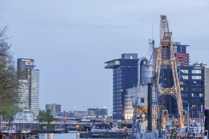 Framed Print : Modern and traditional structures stretch along the harbour at dusk