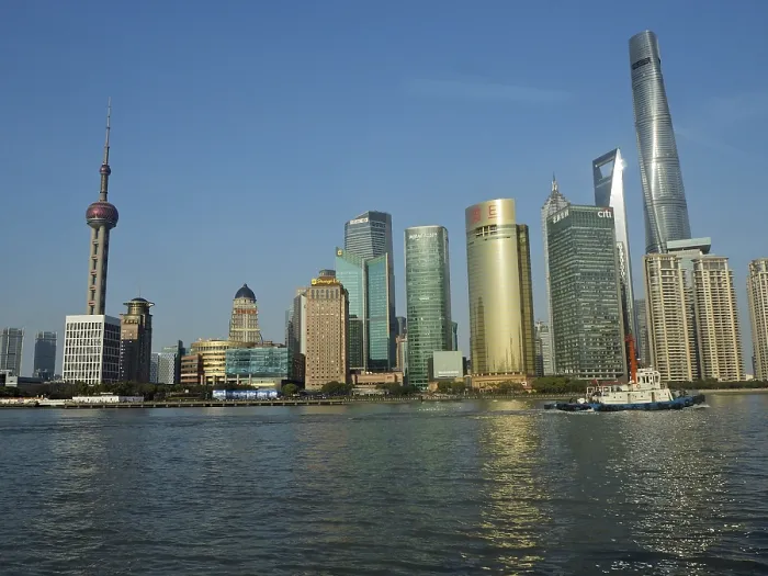 Framed Print : Modern urban skyline of Huangpu Jiang on the water under clear blue sky