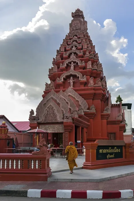 Framed Print : Monk in front of the Khmer-style City Pillar Lak Muang Framed Print : Monk in front of the Khmer-style City Pillar Lak Muang