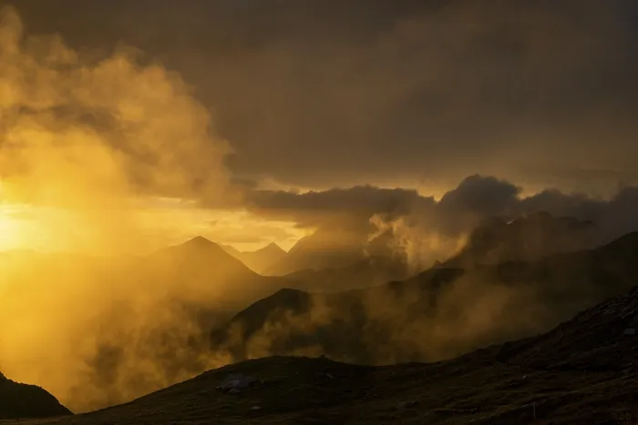 Framed Print : Montafon mountains with dramatic cloudy sky at sunset