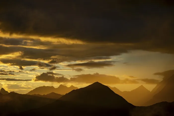 Framed Print : Montafon mountains with dramatic cloudy sky at sunset