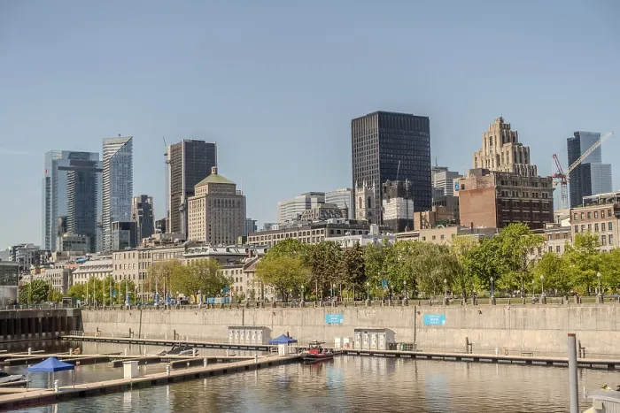 Framed Print : Montreal city skyline panorama over river in the day with urban buildings