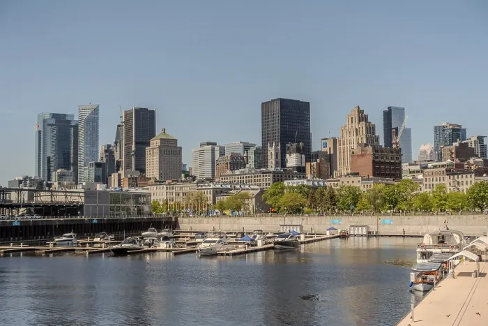 Framed Print : Montreal city skyline panorama over river in the day with urban buildings