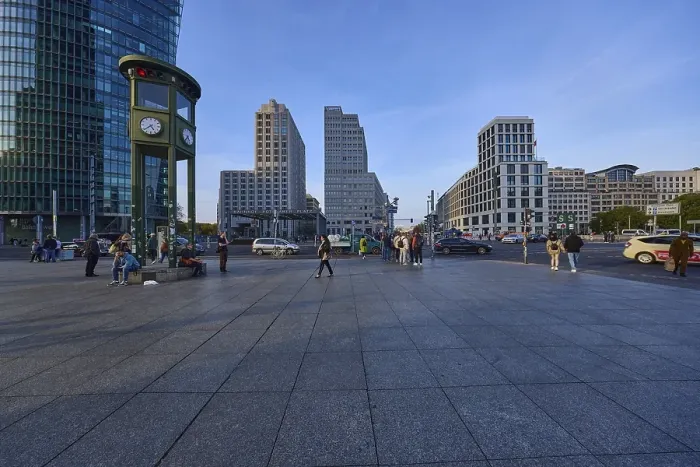 Framed Print : Monument and replica of a historic traffic light system with modern office buildings on Potsdamer Platz in Berlin