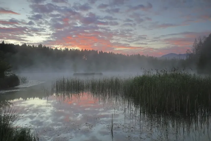 Framed Print : Moorland lake with morning glow