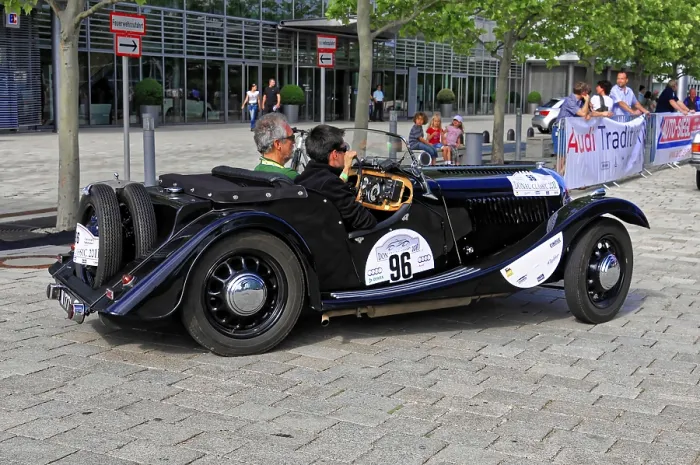 Framed Print : Morgan 4-4-2 Seater, rear view of a black classic car with two drivers at a car race Framed Print : Morgan 4-4-2 Seater, rear view of a black classic car with two drivers at a car race