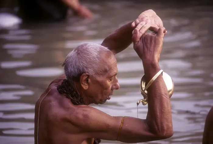 Framed Print : Morning oblation by a brahmin in Ganga Ganges at Varanasi Benaras Framed Print : Morning oblation by a brahmin in Ganga Ganges at Varanasi Benaras