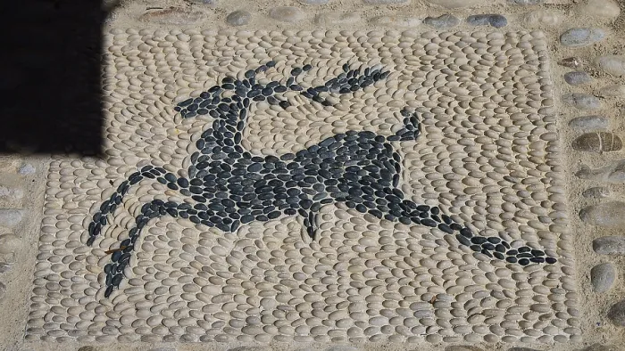 Framed Print : Mosaic artwork of a deer made of pebbles in the street Framed Print : Mosaic artwork of a deer made of pebbles in the street