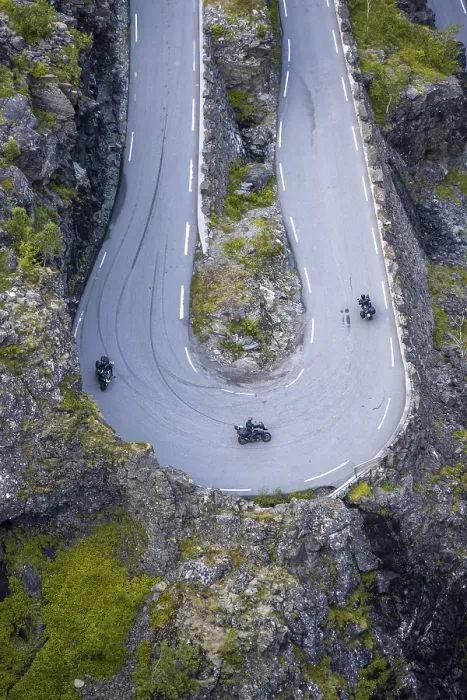 Framed Print : Motorcycles in hairpin bends at the mountain road Trollstigen Framed Print : Motorcycles in hairpin bends at the mountain road Trollstigen