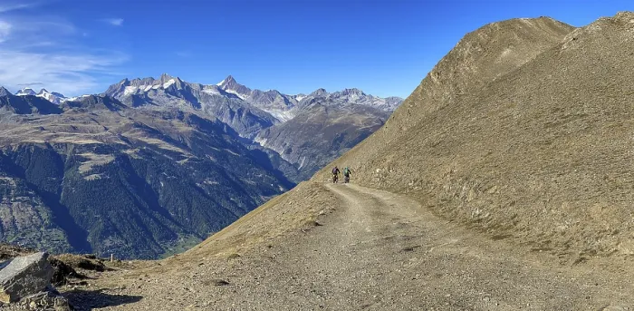 Framed Print : Mountain biker on the Breithorn with panorama over the Upper Valais to the Aletsch area with Eggishorn