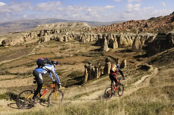 Framed Print : Mountain bikers at Cavusim, Goreme Valley