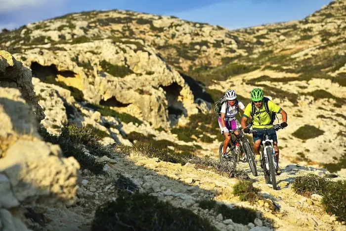 Framed Print : Two mountain bikers cycle in rocky terrain Framed Print : Two mountain bikers cycle in rocky terrain