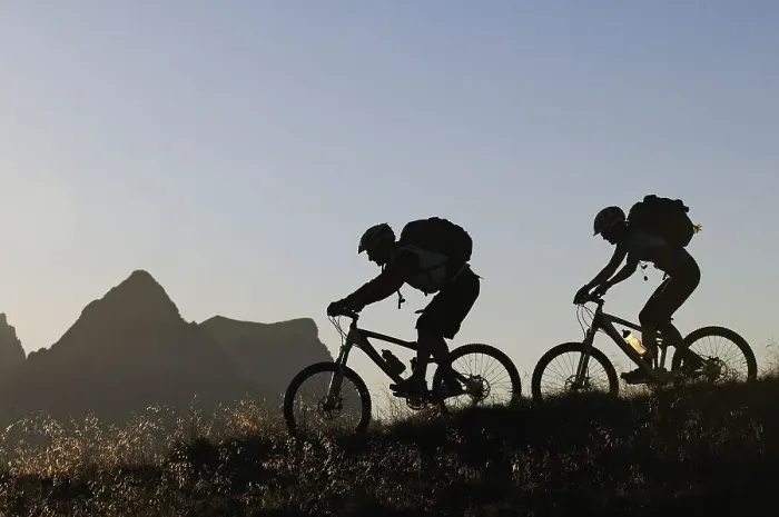 Framed Print : Mountain bikers on Mt Feuerpalven