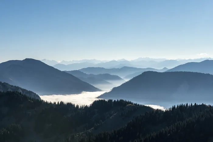 Framed Print : Mountain chains one behind the other in back light