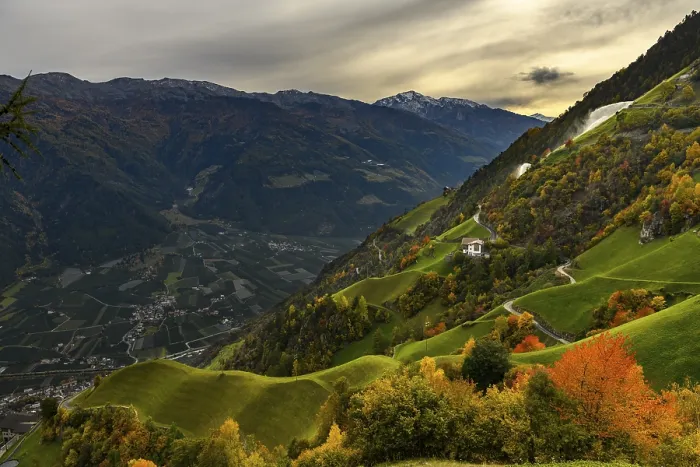Framed Print : Mountain farm in autumnal alpine meadow landscape