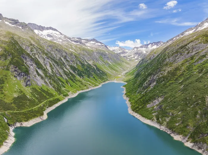 Framed Print : Mountain landscape with a blue lake in the centre