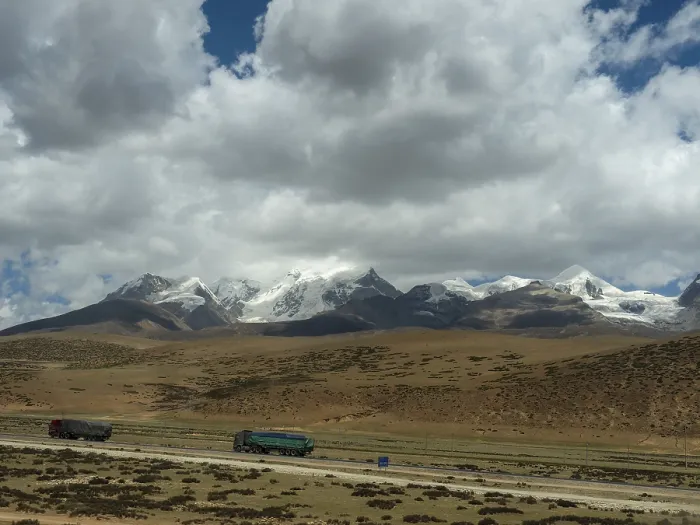 Framed Print : Mountain landscape and lorries in the highlands of Tibet along the Tibet Railway Framed Print : Mountain landscape and lorries in the highlands of Tibet along the Tibet Railway