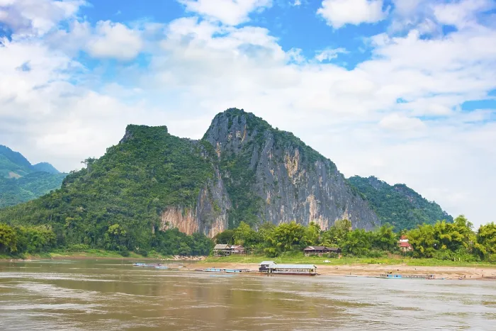 Framed Print : Mountain landscape with overgrown limestone rock and karst mountains along the Mekong River Framed Print : Mountain landscape with overgrown limestone rock and karst mountains along the Mekong River