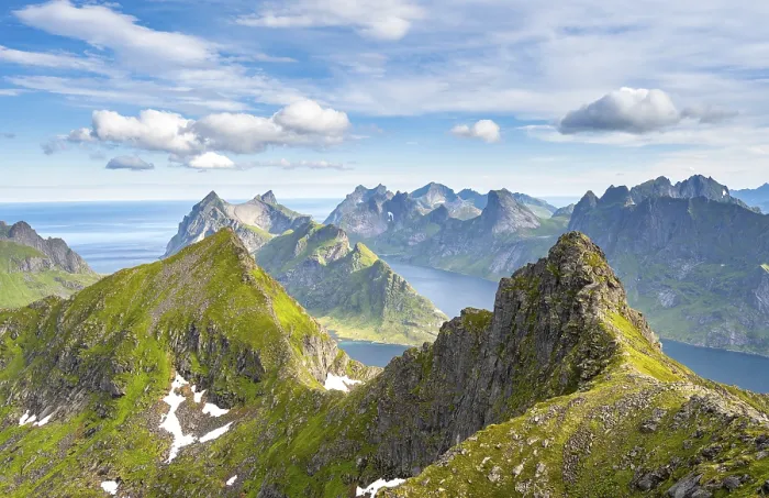Framed Print : Mountain landscape with steep rocky peaks fjords and sea