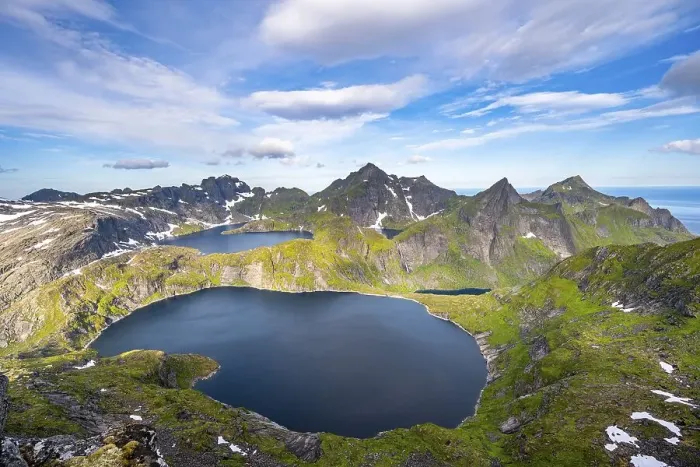 Framed Print : Mountain landscape with steep rocky peaks and lake Tennesvatnet and Krokvatnet Framed Print : Mountain landscape with steep rocky peaks and lake Tennesvatnet and Krokvatnet