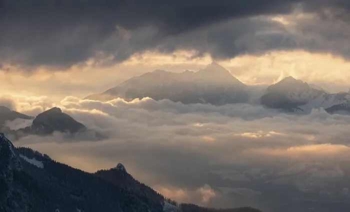Framed Print : Mountain landscape during sunset with mystical clouds