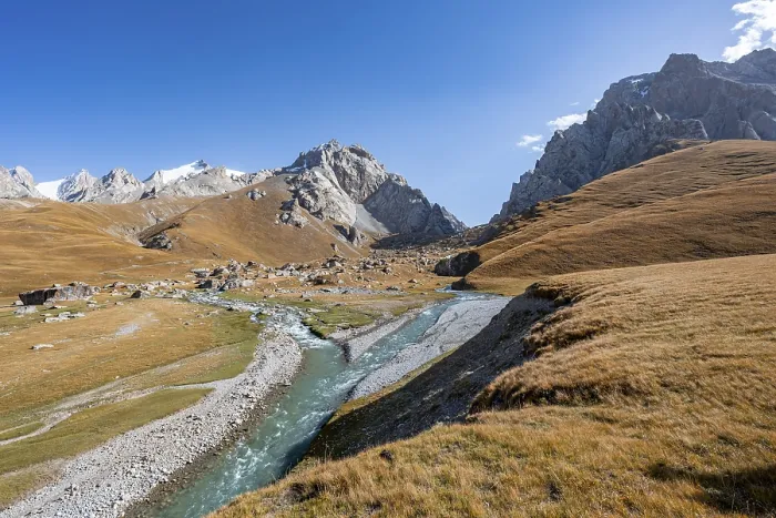 Framed Print : Mountain landscape with yellow meadows and river Kol Suu