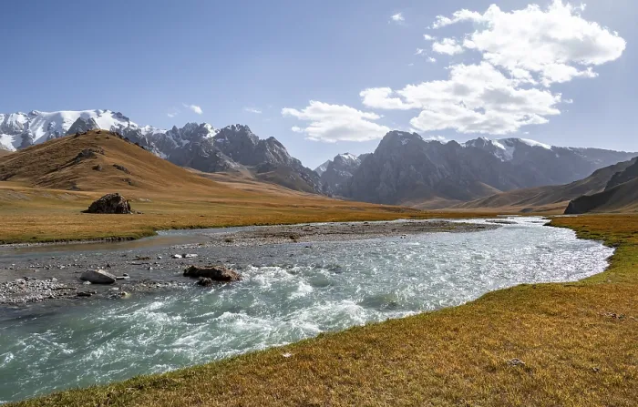 Framed Print : Mountain landscape with yellow meadows and river Kol Suu