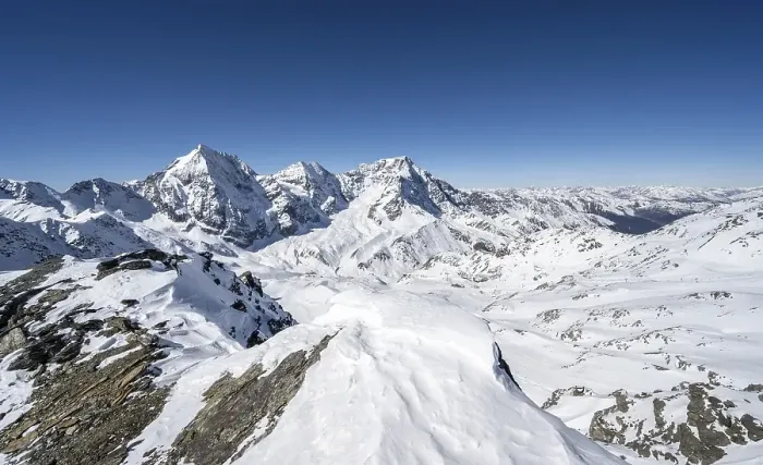 Framed Print : Mountain panorama with snow-covered mountain landscape in winter