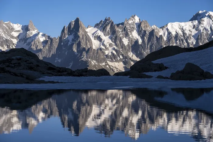 Framed Print : Mountain panorama with water reflection in Lac Blanc