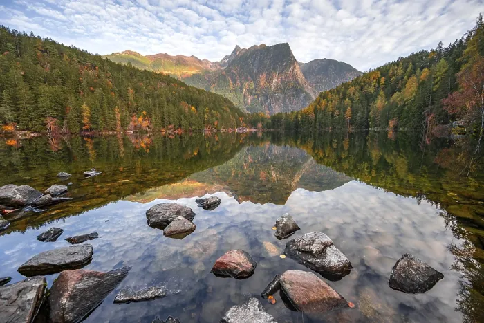Framed Print : Mountain peaks of the Oetztal Alps reflected in Lake Piburger See