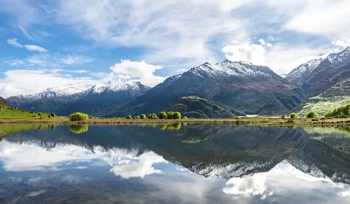 Framed Print : Mountain range reflected in a lake