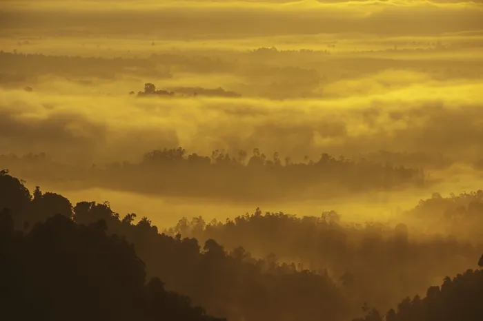 Framed Print : Mountain range view from peak in misty morning sunrise