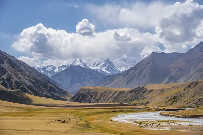 Framed Print : Mountain river in a valley, picturesque mountain landscape with white mountain peaks