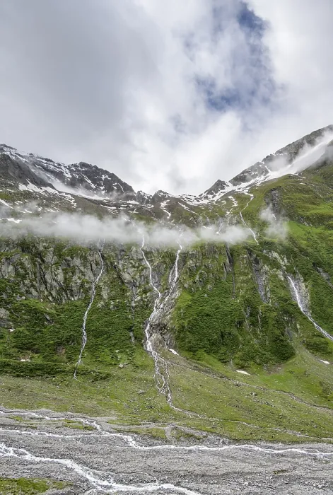 Framed Print : Mountain streams flow over steep mountain slopes into the Schlegeisgrund valley