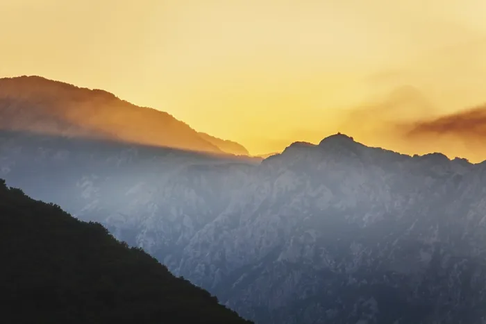 Framed Print : Mountain sunset and colored sky with clouds