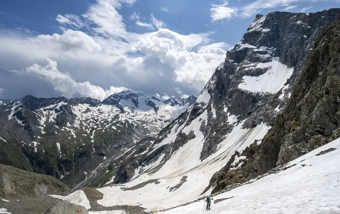 Framed Print : Mountaineer hiking in a snowfield
