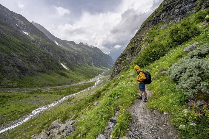 Framed Print : Mountaineer on a hiking trail, green mountain valley Floitengrund with mountain stream Floitenbach Framed Print : Mountaineer on a hiking trail, green mountain valley Floitengrund with mountain stream Floitenbach