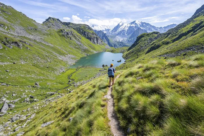 Framed Print : Mountaineer on hiking trail in picturesque mountain landscape Framed Print : Mountaineer on hiking trail in picturesque mountain landscape