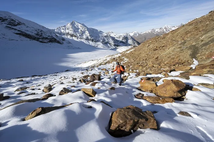 Framed Print : Mountaineer on a hiking trail with snow Framed Print : Mountaineer on a hiking trail with snow