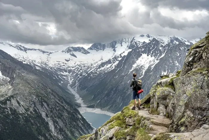 Framed Print : Mountaineer on hiking trail, view of Schlegeisspeicher Framed Print : Mountaineer on hiking trail, view of Schlegeisspeicher