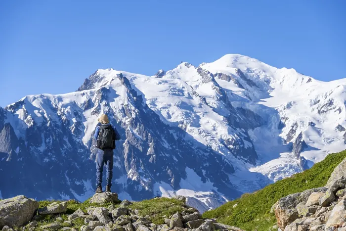 Framed Print : Mountaineer in front of mountain landscape