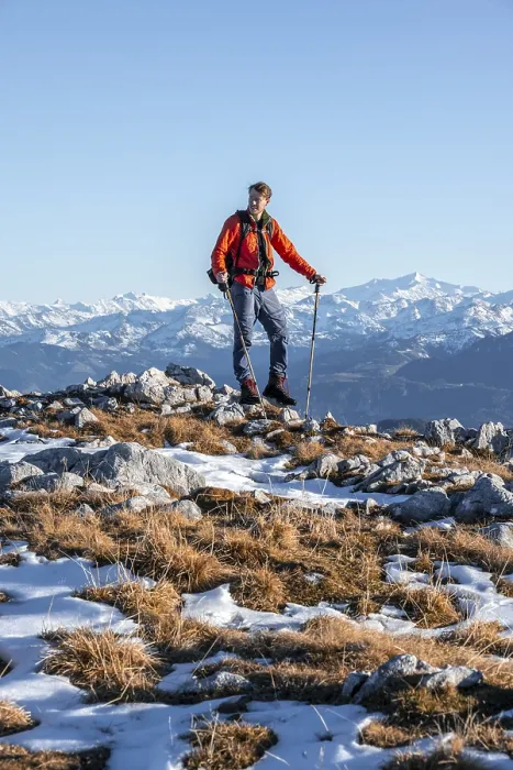 Framed Print : Mountaineer in front of mountain panorama