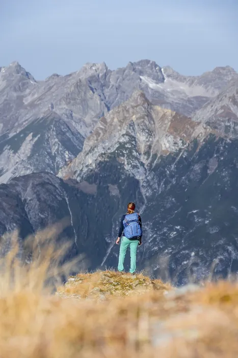 Framed Print : Mountaineer in the mountains in autumn
