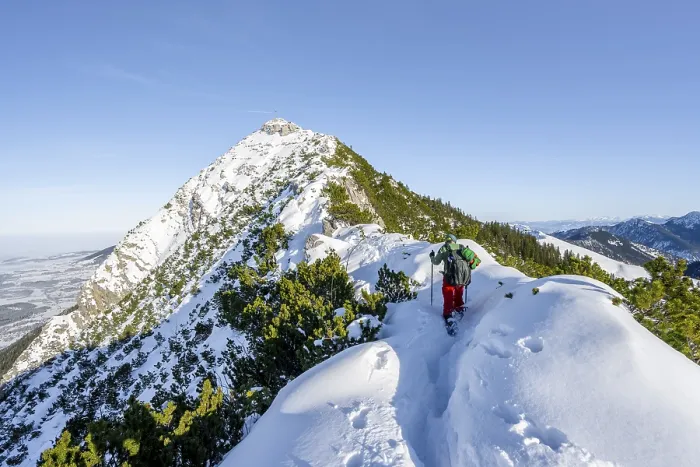 Framed Print : Mountaineer on the ridge of the Aiplspitz in the snow