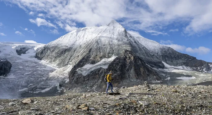 Framed Print : Mountaineer in front of the summit of Mont Blanc de Cheilon and glacier Glacier de Cheilon