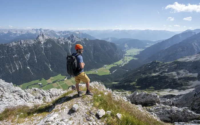 Framed Print : Mountaineer at the summit of the Obere Wettersteinspitze