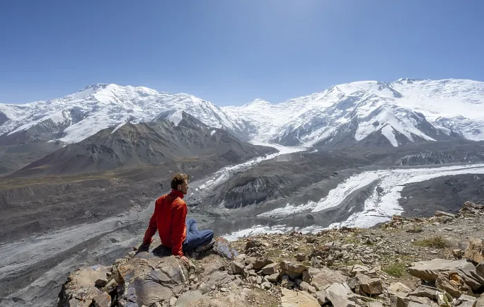 Framed Print : Mountaineer at Traveller's Pass with view of impressive mountain landscape