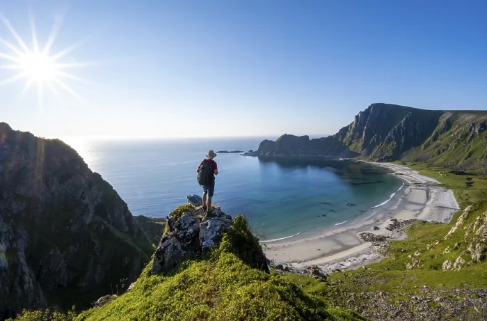 Framed Print : Mountaineer with view of coastal landscape