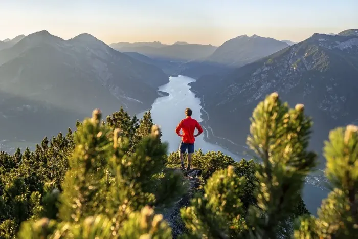 Framed Print : Mountaineer, young man looking over mountain landscape Framed Print : Mountaineer, young man looking over mountain landscape